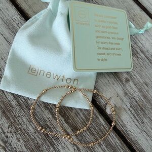 enewton bracelets in gold